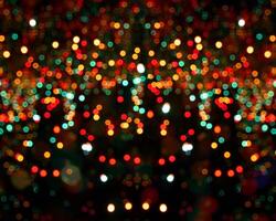 rainbow colorful blur christmas lights background.abstract Lights unfocused blur light dots black . photo