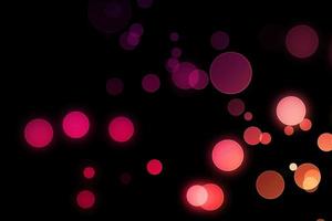 dark pink blur effect black background.abstract black unfocused blur light dots black .