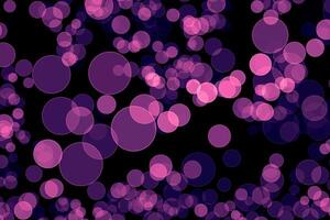 purple blur effect black background.abstract black unfocused blur light dots black . photo