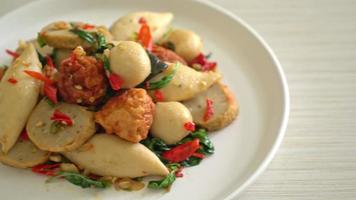 Spicy stir fried fish balls with herbs video