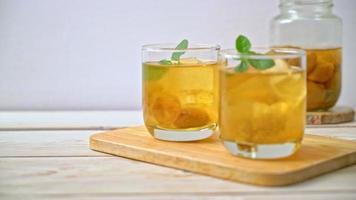 Chinese plum juice with ice and mint
