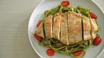 homemade fettuccine spaghetti pasta in pesto sauce with grilled chicken video