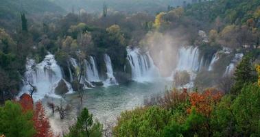 Waterfalls in the middle of autumn forest video