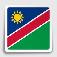 Icono de la bandera de Namibia en papel adhesivo cuadrado con sombra. botón para aplicación móvil o web. vector