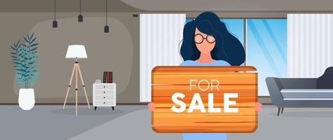 A woman with glasses holds a wooden sign with the inscription for sale. Young woman holding a wooden sign. The concept of selling an apartment, office or building. Vector. vector