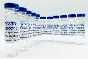 Empty glass vials with Covid19 Vaccine photo