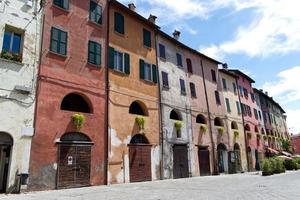 Medieval colored buildings of Brisighella. Old village of Brisighella. Ravenna, Italy.