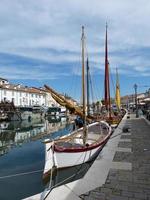 Boats on Leonardesque Canal Port in Cesenatico, Italy photo