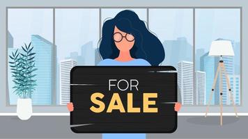 una mujer con gafas sostiene un cartel de madera con la inscripción a la venta. mujer joven con un cartel de madera. el concepto de vender un apartamento, oficina o edificio. vector. vector