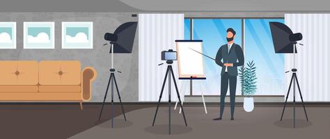 A man in a business suit with a tie is giving a presentation to the camera. The teacher is writing a lesson. The concept of blogging, online training and conferences. Camera on a tripod, softbox. vector