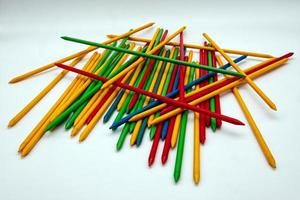 The game of shangai or mikado, colored plastic sticks photo