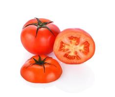 red tomato on white background photo