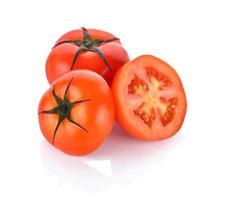 red tomato on white background photo