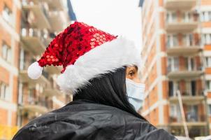 woman with xmas hat photo