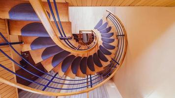 Overhead view of stylish purple color stairs with mats and handlebars with no people. Concept of tourism during pandemic photo