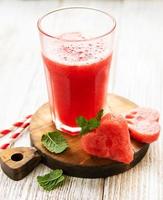 Watermelon smoothie and fresh watermelon photo