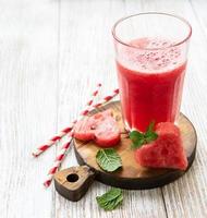 Watermelon smoothie and fresh watermelon photo