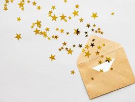 Envelope, blank card and confetti