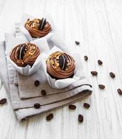 Chocolate cupcakes on a table photo