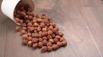 Black Chickpeas or Kala Chana with chana dal pulse isolated on wooden Background. photo