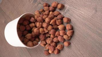 Black Chickpeas or Kala Chana with chana dal pulse isolated on wooden Background. photo