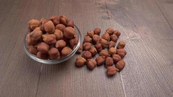Black Chickpeas or Kala Chana with chana dal pulse isolated on wooden Background. photo