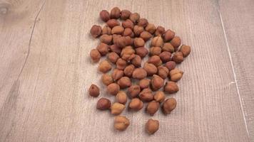 Black Chickpeas or Kala Chana with chana dal pulse isolated on wooden Background. photo