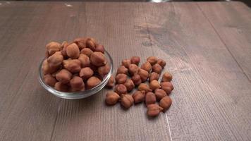 Black Chickpeas or Kala Chana with chana dal pulse isolated on wooden Background. photo