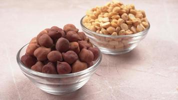 Black Chickpeas or Kala Chana with chana dal pulse isolated on wooden Background. photo