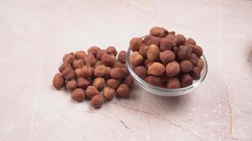 Black Chickpeas or Kala Chana with chana dal pulse isolated on wooden Background. photo