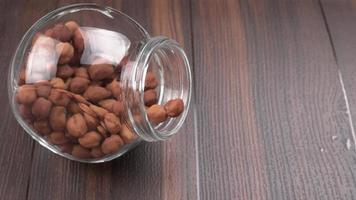 Black Chickpeas or Kala Chana with chana dal pulse isolated on wooden Background. photo