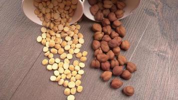 Black Chickpeas or Kala Chana with chana dal pulse isolated on wooden Background. photo