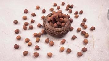 Black Chickpeas or Kala Chana with chana dal pulse isolated on wooden Background. photo
