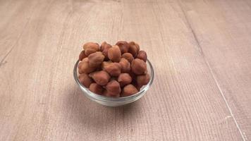 Black Chickpeas or Kala Chana with chana dal pulse isolated on wooden Background. photo