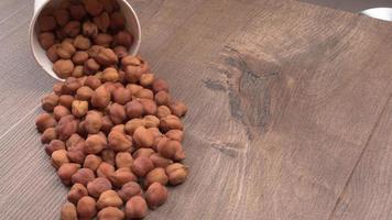 Black Chickpeas or Kala Chana with chana dal pulse isolated on wooden Background. photo