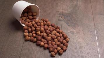 Black Chickpeas or Kala Chana with chana dal pulse isolated on wooden Background. photo