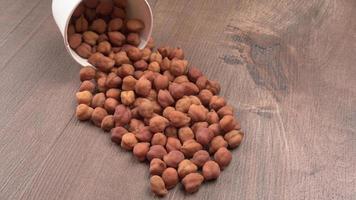 Black Chickpeas or Kala Chana with chana dal pulse isolated on wooden Background. photo