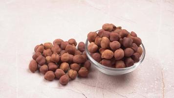 Black Chickpeas or Kala Chana with chana dal pulse isolated on wooden Background. photo