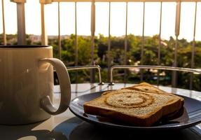 Breakfast with morning light at the balcony photo