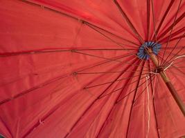 Red canvas outdoor umbrella photo