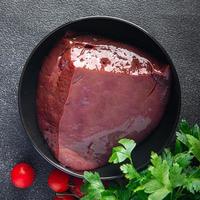 raw liver beef or pork healthy meal food diet keto or paleo photo