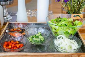 Breakfast buffet salad on table decoration at buffet self service at hotel. photo