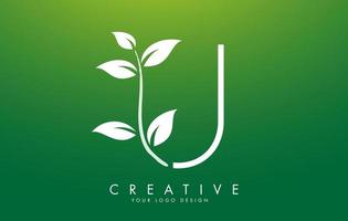 White Leaf Letter U Logo Design with Leaves on a Branch and Green Background. Letter U with nature concept. vector