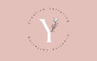 White Letter Y Logo with circle lettering design and outline leaves and pastel backgound. vector