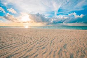 Closeup sea sand beach. Panoramic beach landscape. Inspire tropi photo