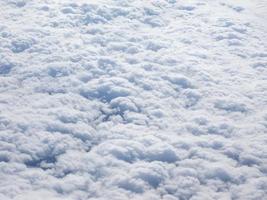 Clouds seen from plane background photo