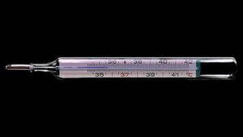 Temperature rising on medical classical thermometer. Mercury thermometer, Celsius scale
