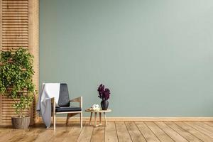 interior minimalista moderno con un sillón sobre fondo de pared verde vacía. foto