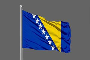 bosnia y herzegovina, bandera ondeante foto