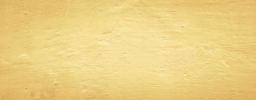 abstract yellow concrete wall texture background, panoramic background photo